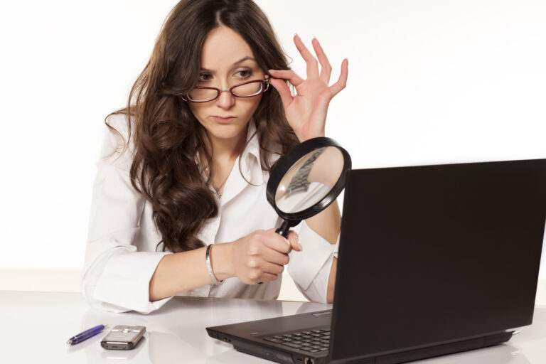 woman with magnifying glass