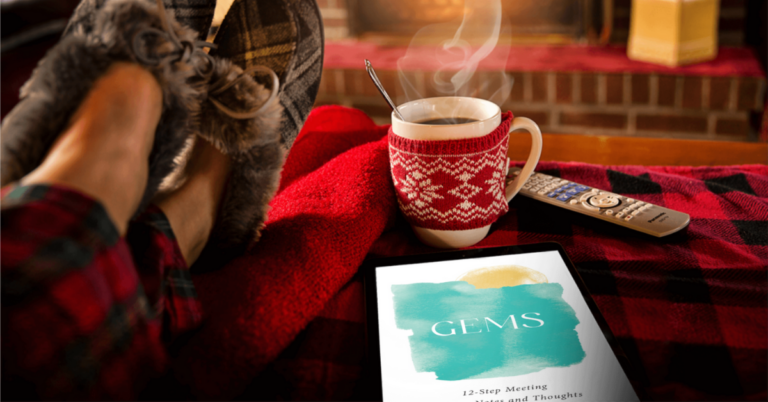 GEMS book in a warm holiday scene with comfy slippers and blazing fire