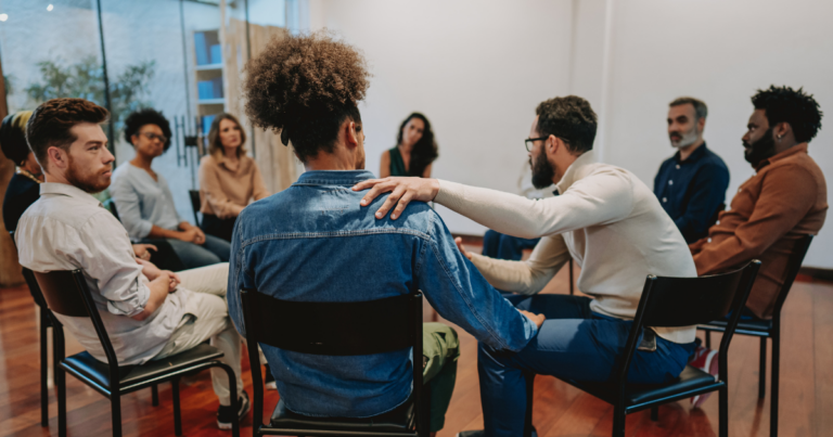 support group celebrating a returning member