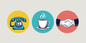 a phone, a coffee cup, and a handshake