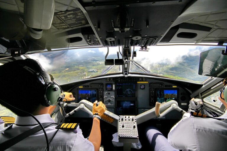 Pilot in airplane cockpit symbolizing spiritual guidance in addiction recovery